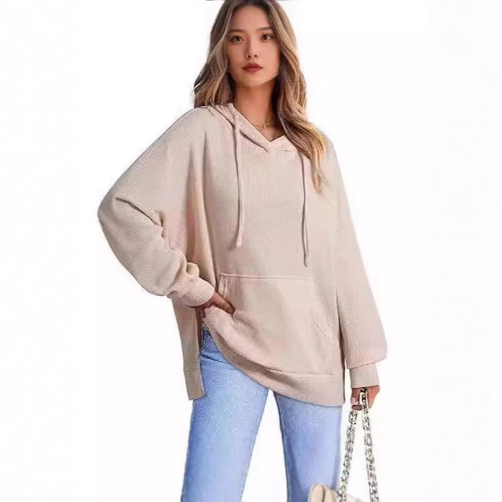 Kvinnors avslappnad hoodie med texturerad design och sänkta axlar Mirla-Eva Jonsson
