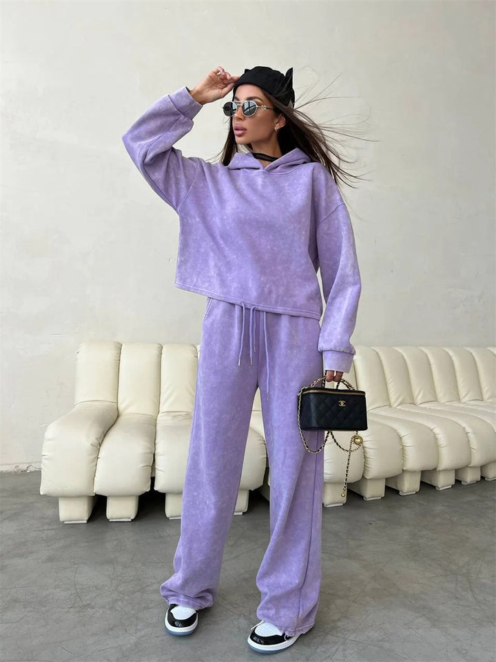 Kvinnors avslappnad hoodie set med vida byxor och elastisk midja Mirla-Eva Jonsson
