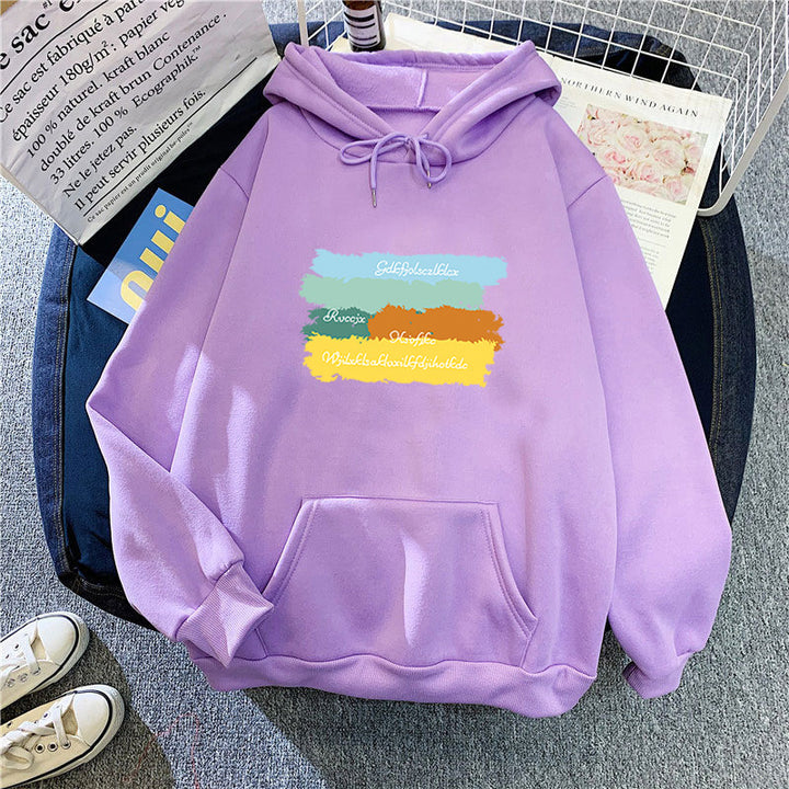 Kvinnors avslappnad huvtröja med kreativ grafisk design Mirla-Eva Jonsson