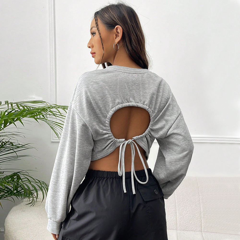 Kvinnors avslappnad kort sweatshirt med vida ärmar och rund hals Mirla-Eva Jonsson