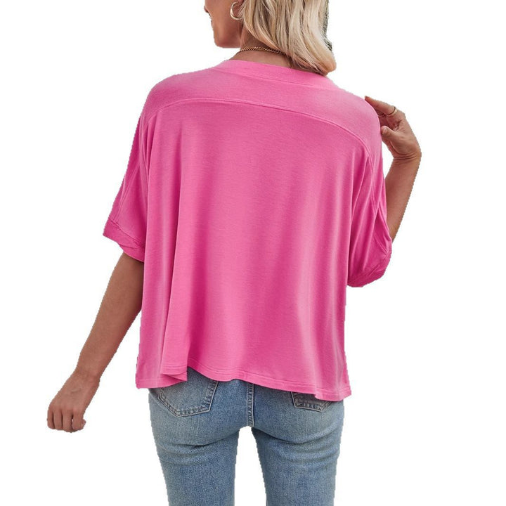 Kvinnors avslappnad kort t-shirt med vida ärmar Mirla-Eva Jonsson