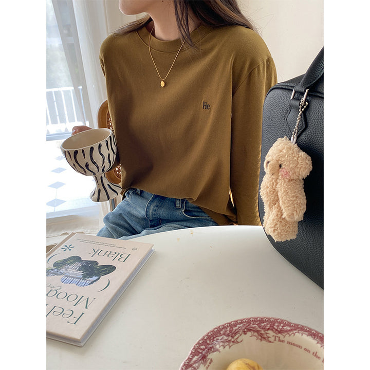 Kvinnors avslappnad långärmad skjorta med minimalistiska detaljer Mirla-Eva Jonsson
