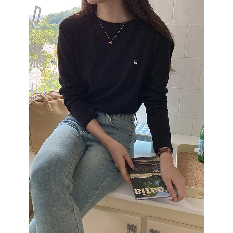 Kvinnors avslappnad långärmad skjorta med minimalistiska detaljer Mirla-Eva Jonsson