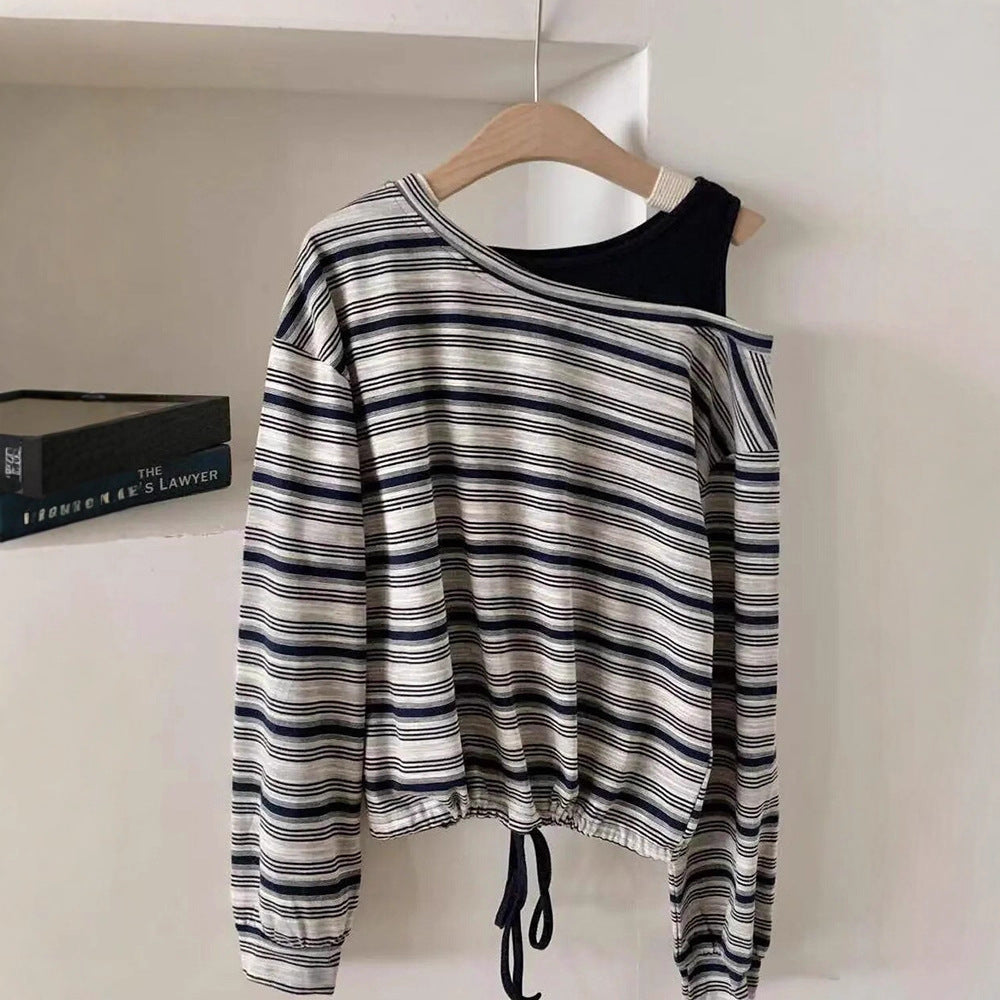 Kvinnors avslappnad långärmad skjorta med off-shoulder design Mirla-Eva Jonsson
