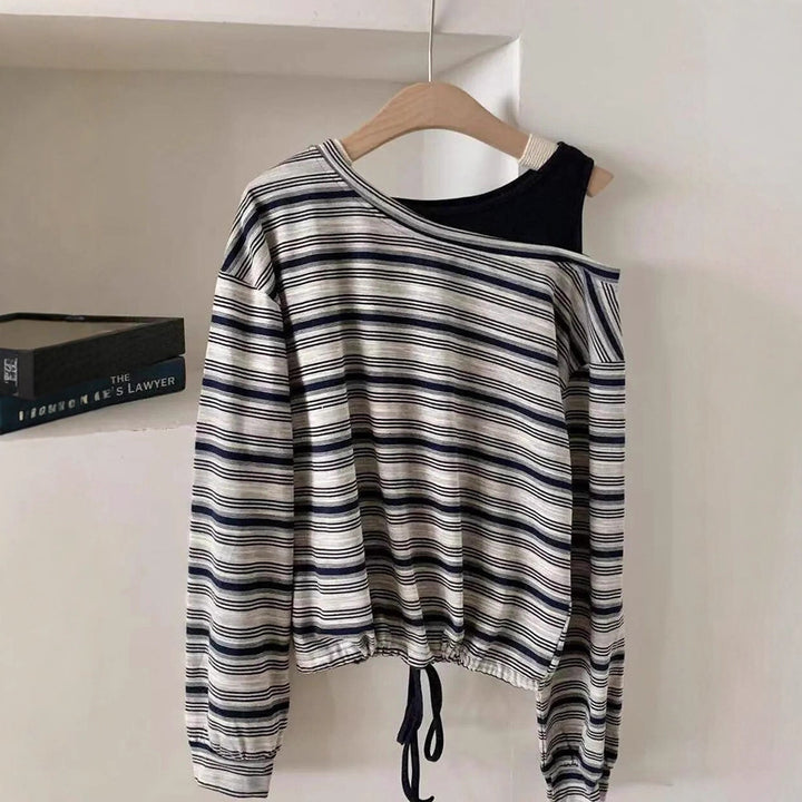 Kvinnors avslappnad långärmad skjorta med off-shoulder design Mirla-Eva Jonsson