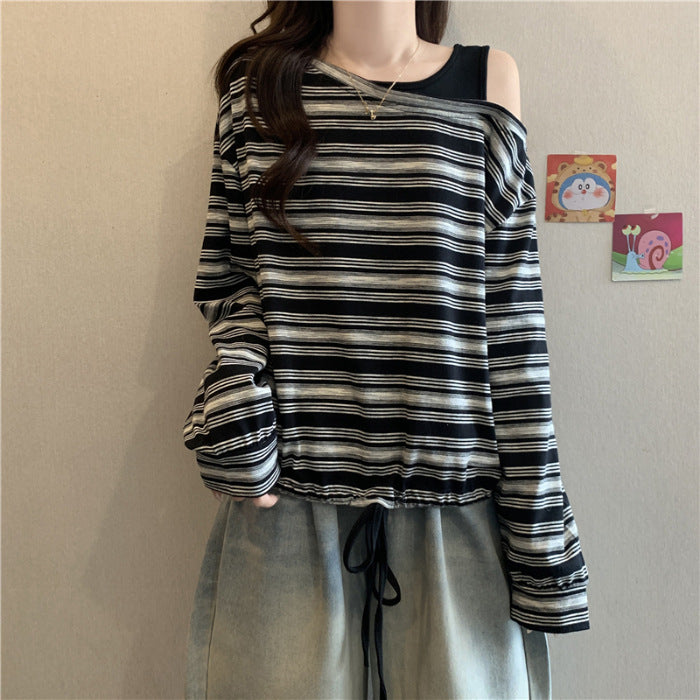 Kvinnors avslappnad långärmad skjorta med off-shoulder design Mirla-Eva Jonsson