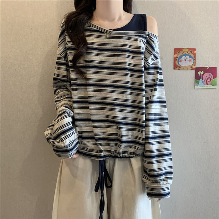 Kvinnors avslappnad långärmad skjorta med off-shoulder design Mirla-Eva Jonsson