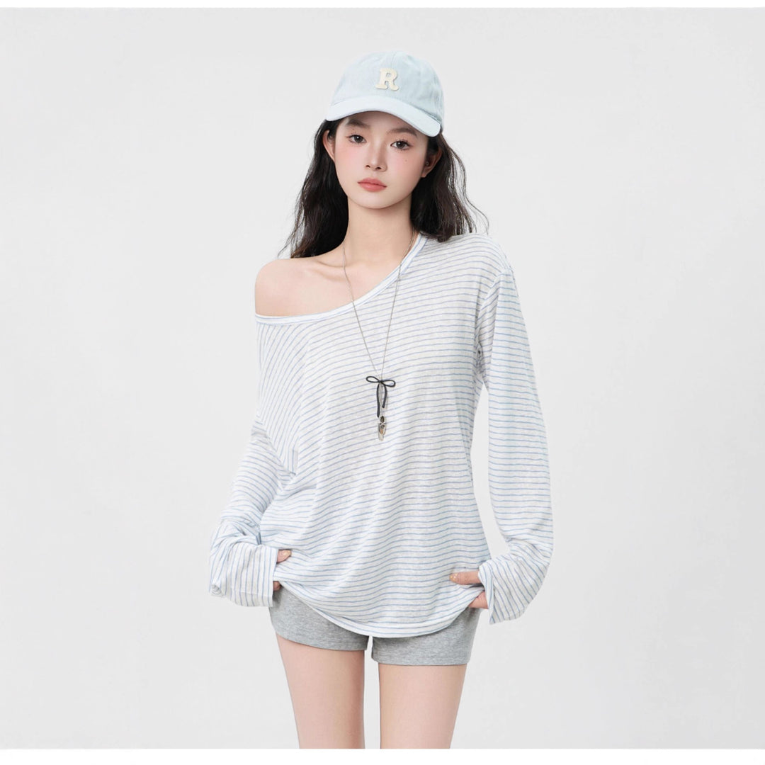 Kvinnors avslappnad långärmad t-shirt med asymmetrisk design Mirla-Eva Jonsson