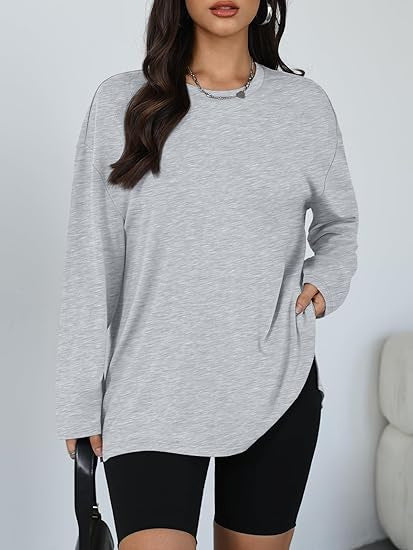 Kvinnors avslappnad långärmad t-shirt med sidofickor Mirla-Eva Jonsson