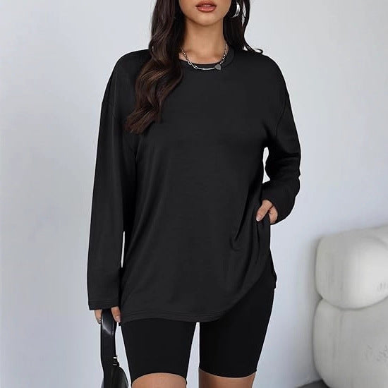 Kvinnors avslappnad långärmad t-shirt med sidofickor Mirla-Eva Jonsson
