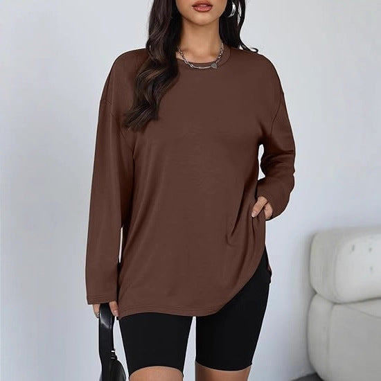 Kvinnors avslappnad långärmad t-shirt med sidofickor Mirla-Eva Jonsson
