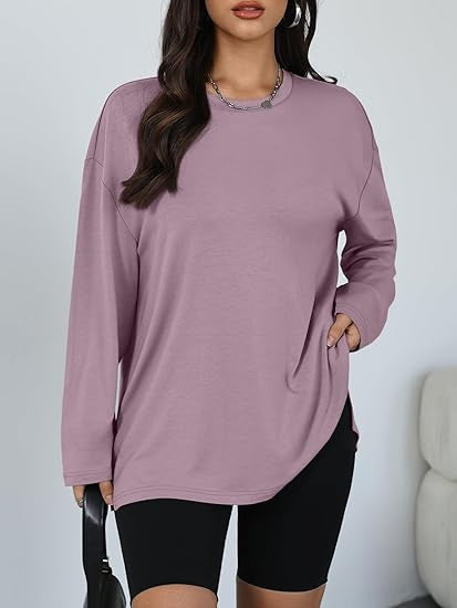 Kvinnors avslappnad långärmad t-shirt med sidofickor Mirla-Eva Jonsson
