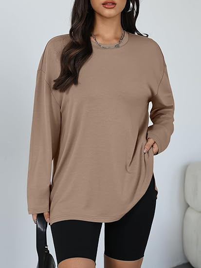 Kvinnors avslappnad långärmad t-shirt med sidofickor Mirla-Eva Jonsson