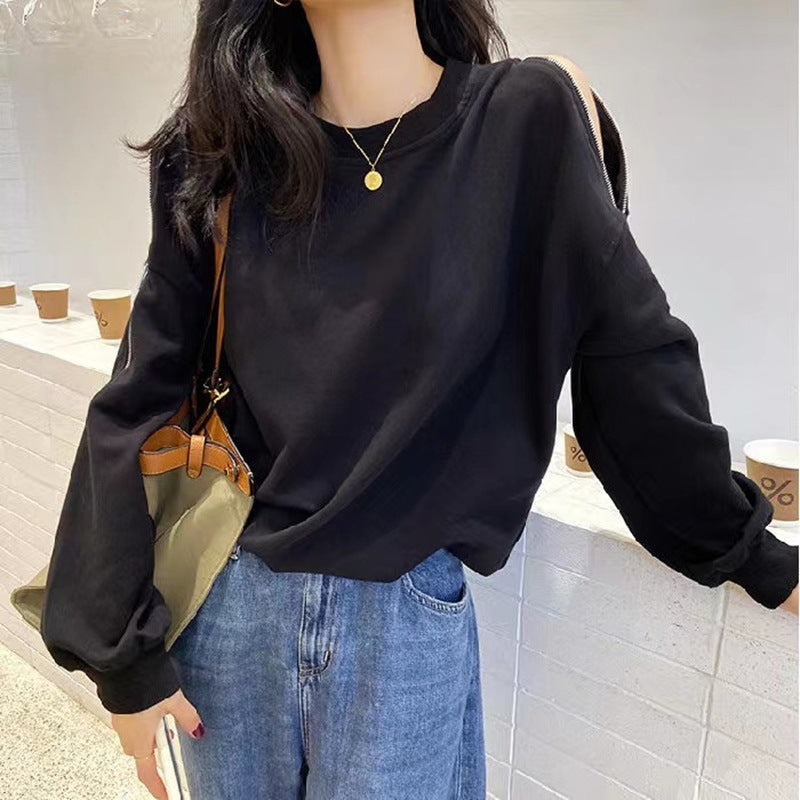 Kvinnors avslappnad oversize pullover med öppna axlar och modern design-Eva Jonsson
