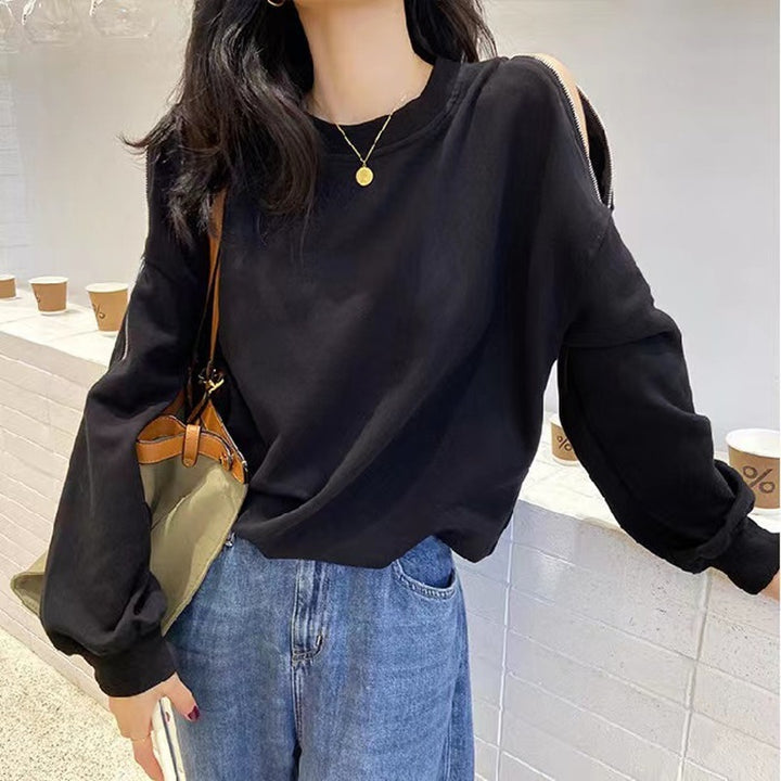 Kvinnors avslappnad oversize pullover med öppna axlar och modern design-Eva Jonsson