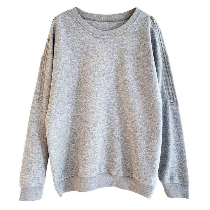 Kvinnors avslappnad oversize pullover med öppna axlar och modern design-Eva Jonsson