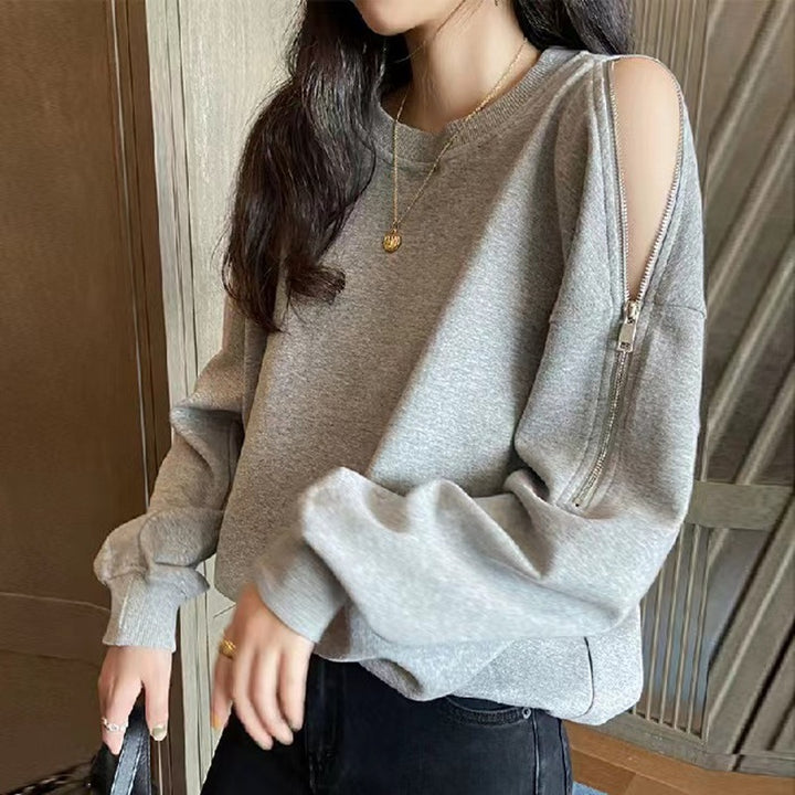 Kvinnors avslappnad oversize pullover med öppna axlar och modern design-Eva Jonsson