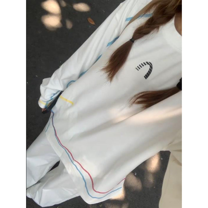 Kvinnors avslappnad oversize sweatshirt med färgglada accentremsor Mirla-Eva Jonsson