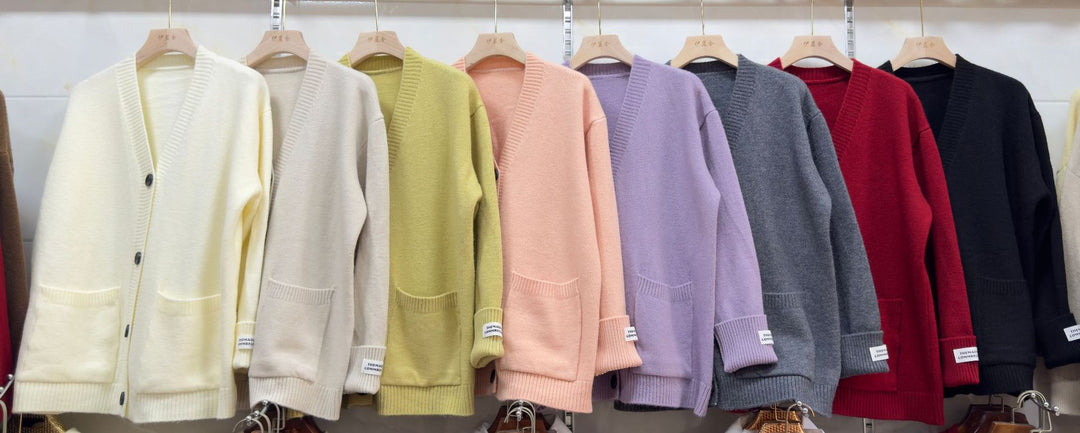 Kvinnors avslappnad oversized cardigan med stora fickor och knapppdetaljer Mirla-Eva Jonsson
