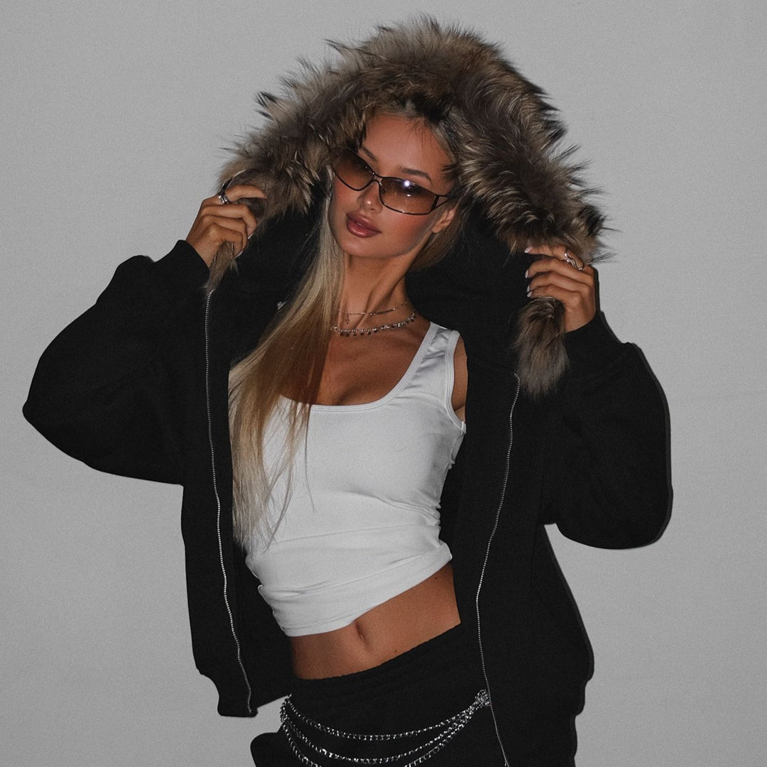 Kvinnors avslappnad oversized hoodie med dragkedja och sidofickor Mirla-Eva Jonsson