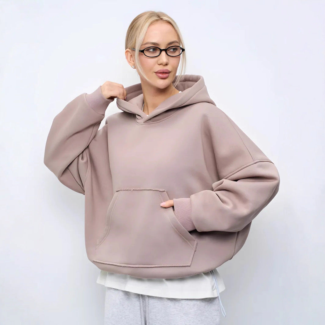 Kvinnors avslappnad oversized hoodie med känguruficka och mjukt foder Mirla-Eva Jonsson