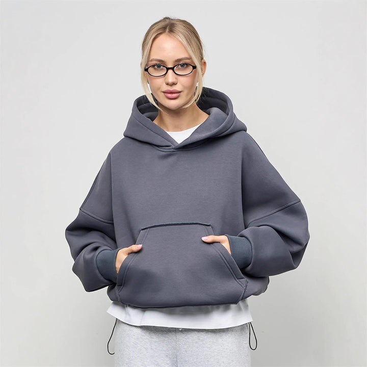 Kvinnors avslappnad oversized hoodie med känguruficka och mjukt foder Mirla-Eva Jonsson