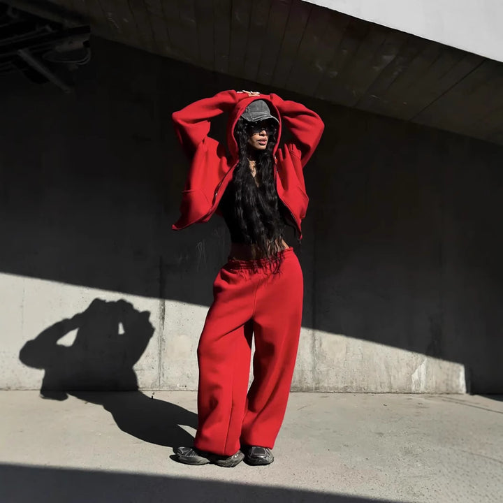 Kvinnors avslappnad oversized jacka med full dragkedja och vida byxor Mirla-Eva Jonsson