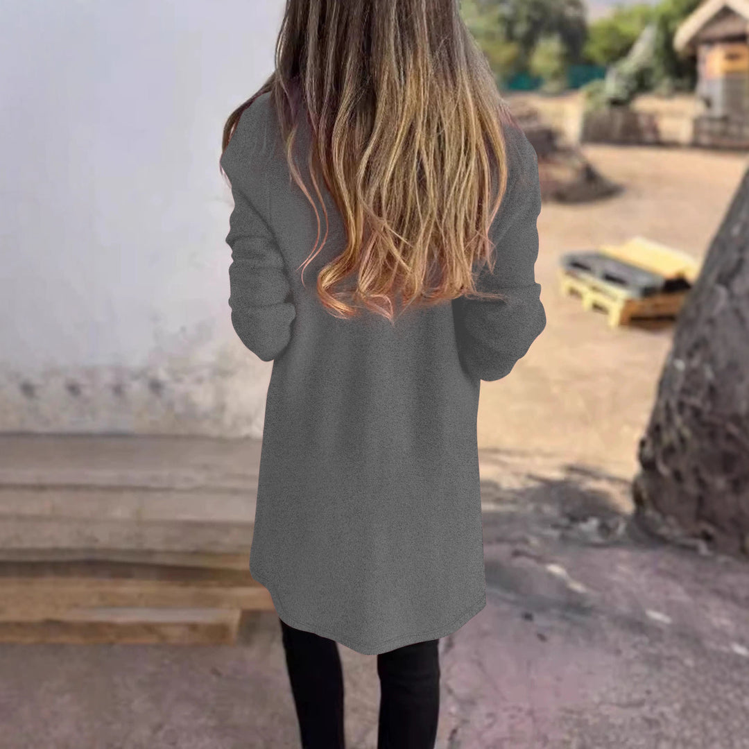Kvinnors avslappnad oversized rock med sidofickor och öppen krage Mirla-Eva Jonsson