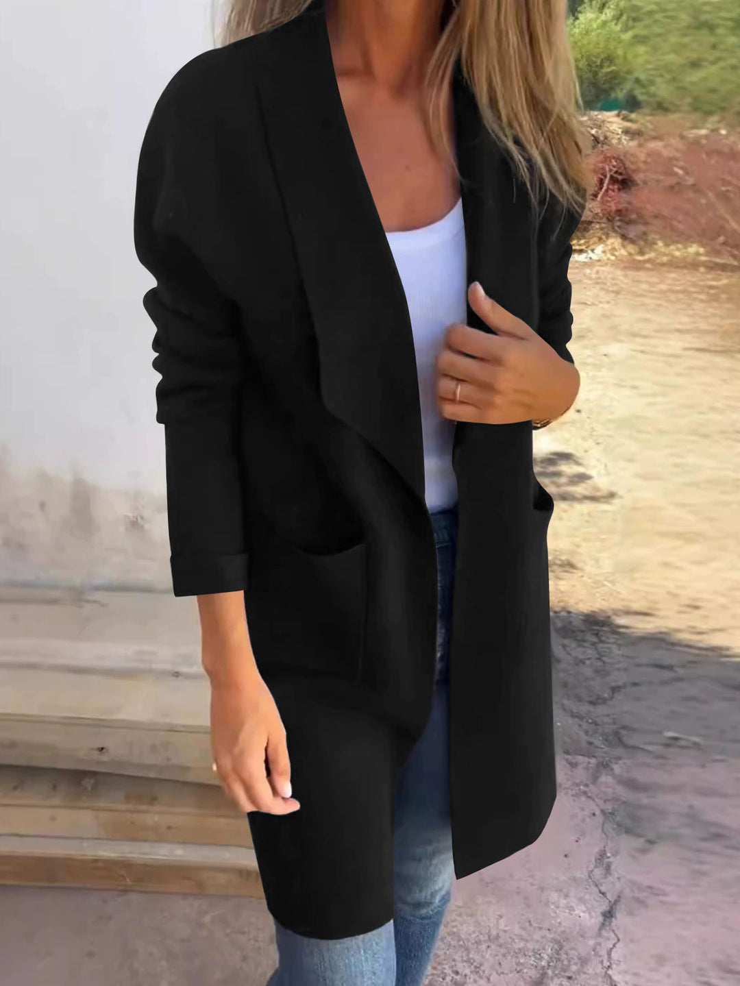 Kvinnors avslappnad oversized rock med sidofickor och öppen krage Mirla-Eva Jonsson
