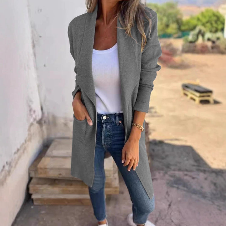 Kvinnors avslappnad oversized rock med sidofickor och öppen krage Mirla-Eva Jonsson