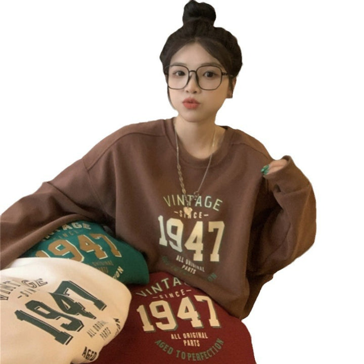 Kvinnors avslappnad oversized sweatshirt med vintage tryck Mirla-Eva Jonsson