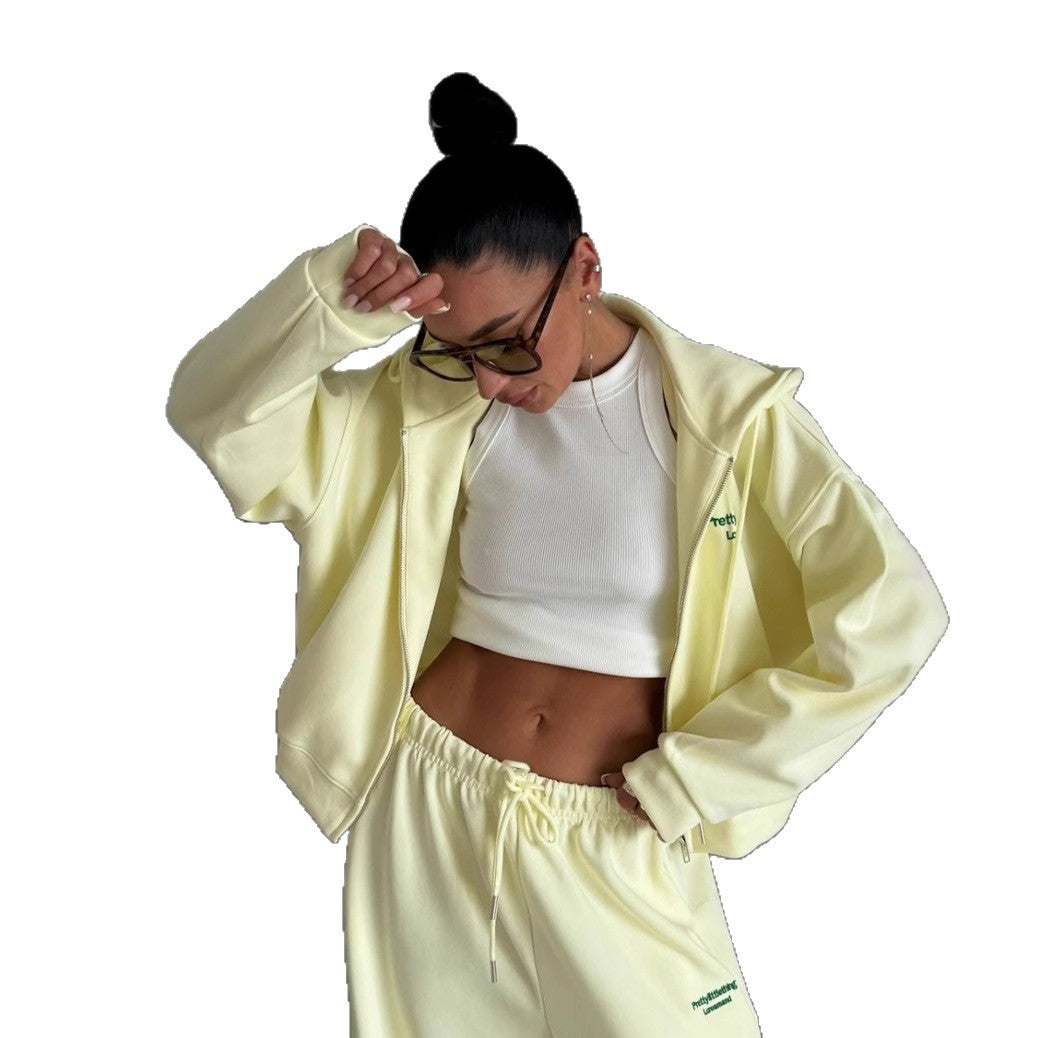 Kvinnors avslappnad oversized träningsdräkt med stilfull krage och elastisk midjeband Mirla-Eva Jonsson