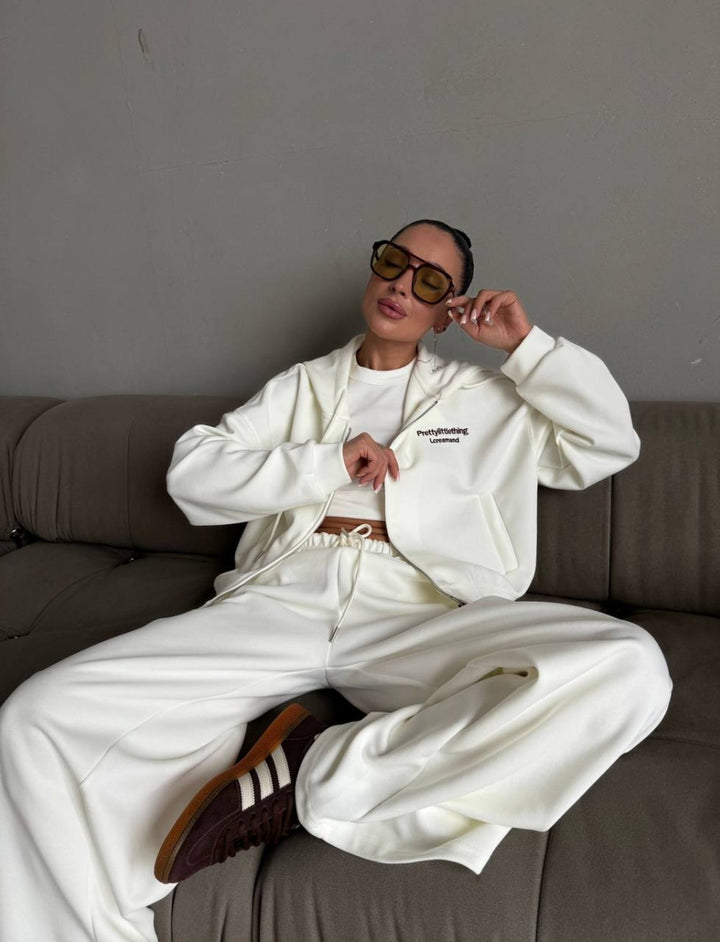 Kvinnors avslappnad oversized träningsdräkt med stilfull krage och elastisk midjeband Mirla-Eva Jonsson