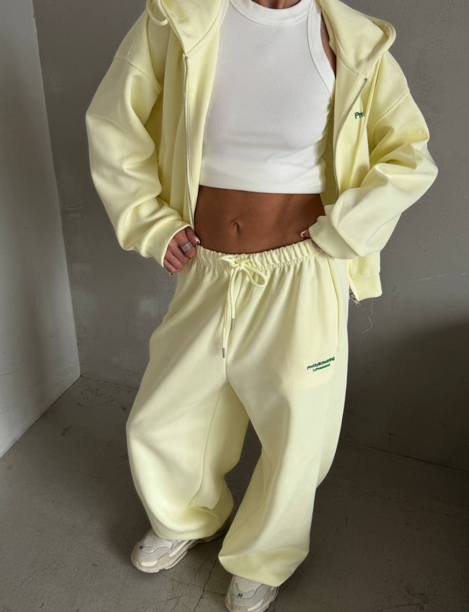 Kvinnors avslappnad oversized träningsdräkt med stilfull krage och elastisk midjeband Mirla-Eva Jonsson