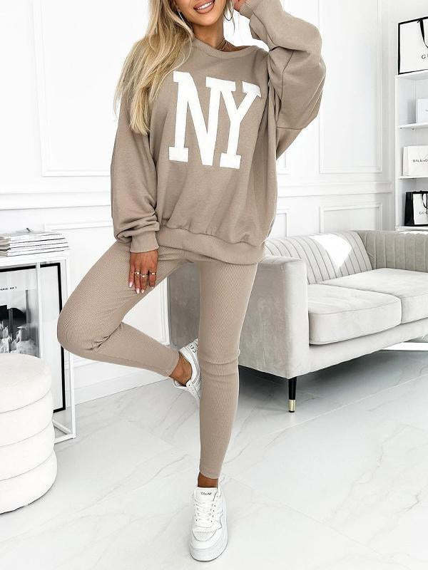 Kvinnors avslappnad oversized tröja med blommig logotyp och matchande leggings Mirla-Eva Jonsson