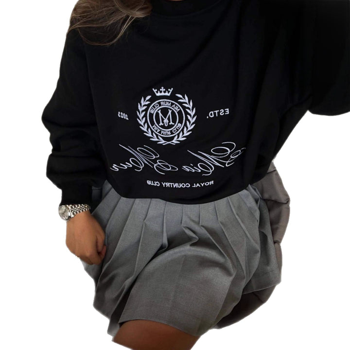 Kvinnors avslappnad oversized tröja med elegant broderidesign Mirla-Eva Jonsson
