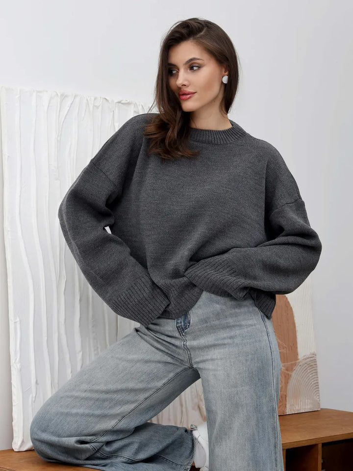 Kvinnors avslappnad oversized tröja med kortade ärmar och texturerad stickad mönster Mirla-Eva Jonsson