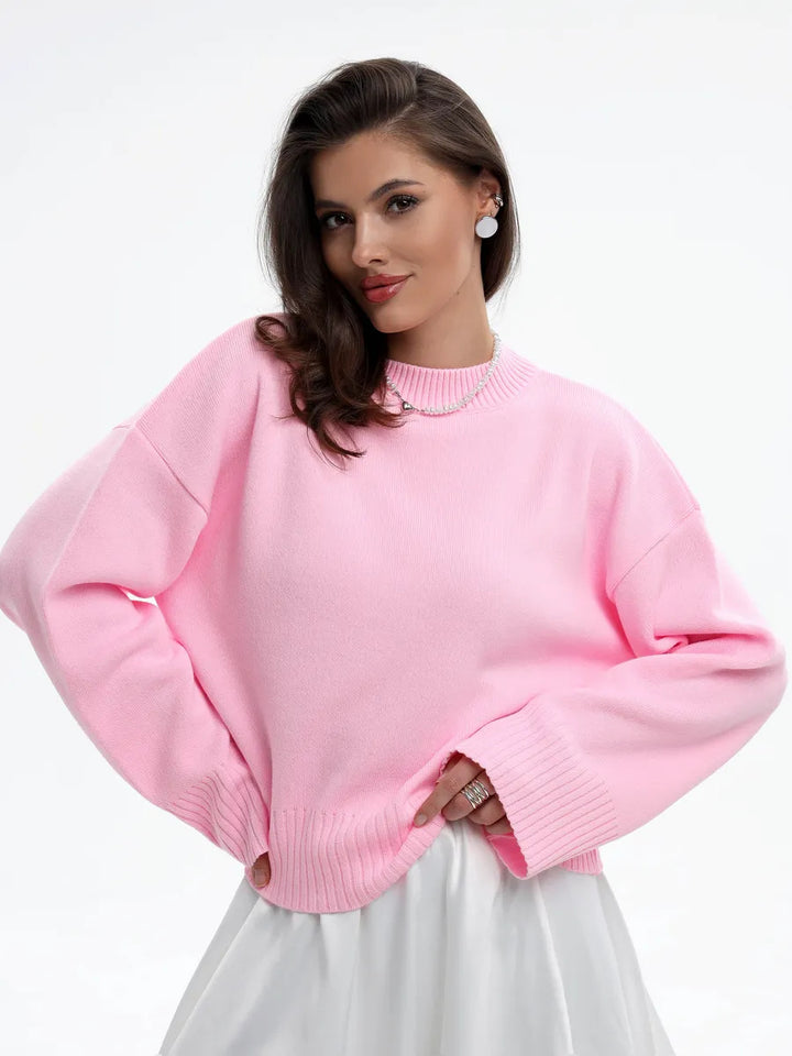 Kvinnors avslappnad oversized tröja med kortade ärmar och texturerad stickad mönster Mirla-Eva Jonsson