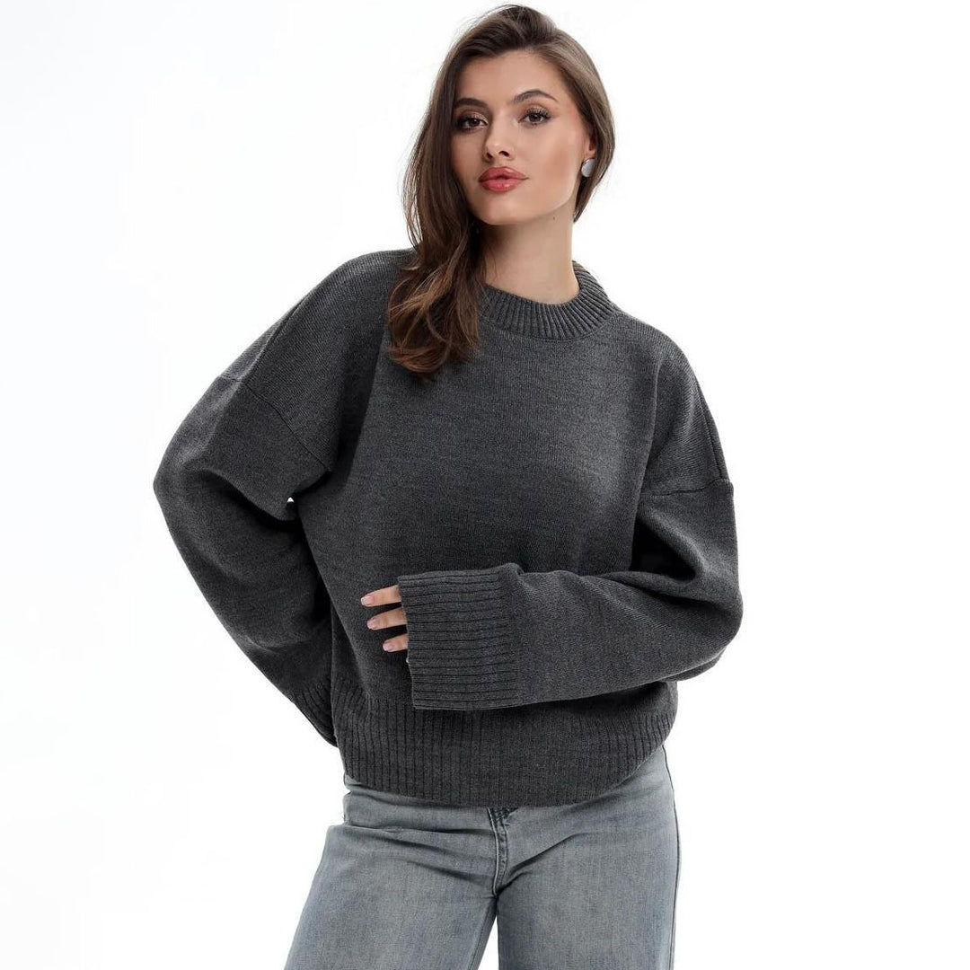 Kvinnors avslappnad oversized tröja med kortade ärmar och texturerad stickad mönster Mirla-Eva Jonsson
