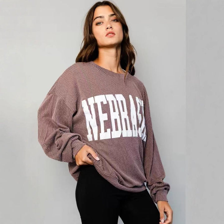 Kvinnors avslappnad oversized tröja med tryck Mirla-Eva Jonsson