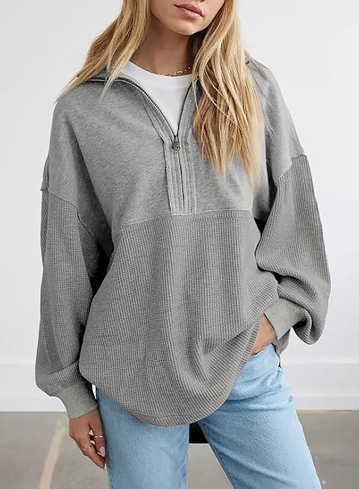 Kvinnors avslappnad pullover med dragkedja och lös passform Mirla-Eva Jonsson