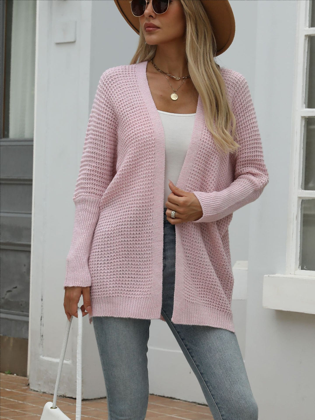 Kvinnors avslappnad stickad cardigan med öppen front och grov textur Mirla-Eva Jonsson