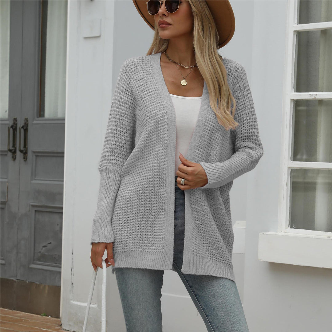 Kvinnors avslappnad stickad cardigan med öppen front och grov textur Mirla-Eva Jonsson