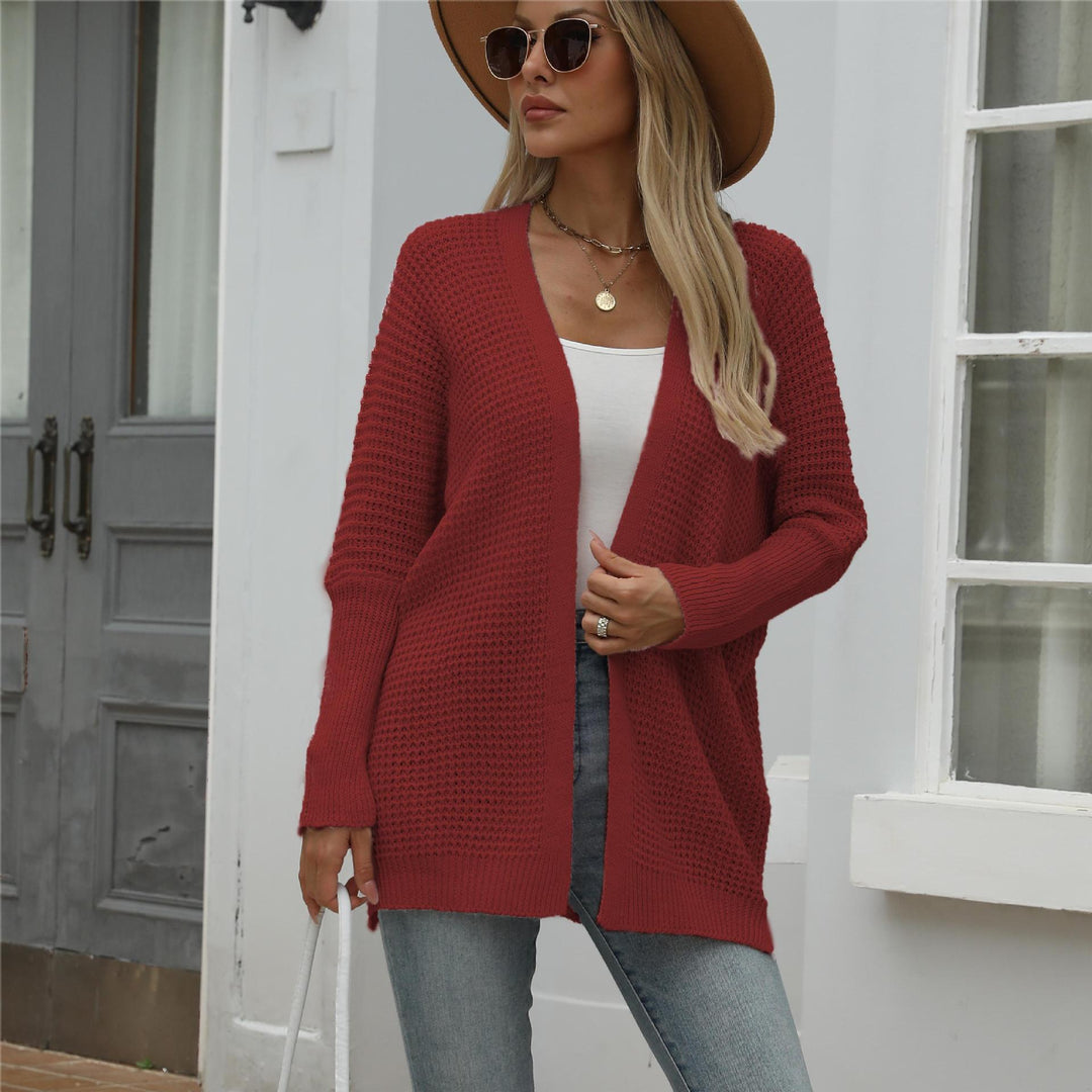 Kvinnors avslappnad stickad cardigan med öppen front och grov textur Mirla-Eva Jonsson