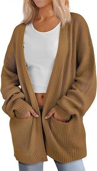 Kvinnors avslappnad stickad cardigan med stora fickor och öppen design Mirla-Eva Jonsson