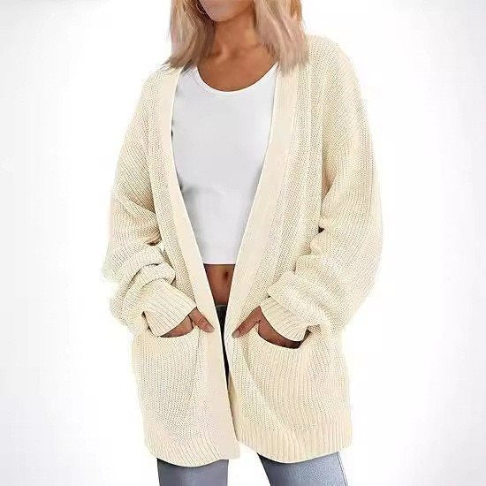 Kvinnors avslappnad stickad cardigan med stora fickor och öppen design Mirla-Eva Jonsson