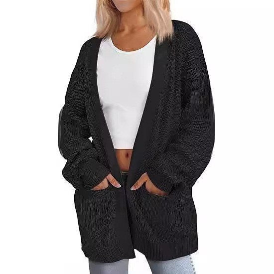Kvinnors avslappnad stickad cardigan med stora fickor och öppen design Mirla-Eva Jonsson