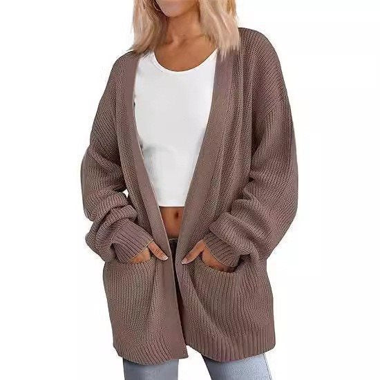 Kvinnors avslappnad stickad cardigan med stora fickor och öppen design Mirla-Eva Jonsson
