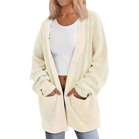 Kvinnors avslappnad stickad cardigan med stora fickor och öppen design Mirla-Eva Jonsson