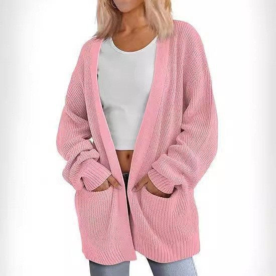 Kvinnors avslappnad stickad cardigan med stora fickor och öppen design Mirla-Eva Jonsson